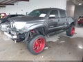2009 Toyota Tacoma — photo 2 of 16 | VIN 3TMJU62N99M077836