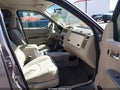 2008 Mercury Mariner — photo 5 of 11 | VIN 4M2CU91108KJ05922