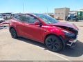 2024 Tesla Model Y — photo 1 of 16 | VIN 7SAYGDED1RF131005