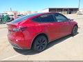 2024 Tesla Model Y — photo 4 of 16 | VIN 7SAYGDED1RF131005