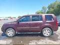 2010 Honda Pilot — photo 14 of 16 | VIN 5FNYF3H27AB010598