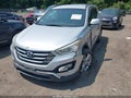 2013 Hyundai Santa Fe — photo 2 of 11 | VIN 5XYZUDLA9DG028340