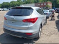 2013 Hyundai Santa Fe — photo 4 of 11 | VIN 5XYZUDLA9DG028340