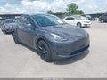 2023 Tesla Model Y — photo 1 of 18 | VIN 7SAYGDEE9PA121261