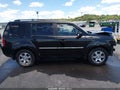 2011 Honda Pilot — photo 14 of 18 | VIN 5FNYF4H93BB504252