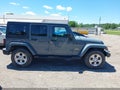 2014 Jeep Wrangler Unlimited — photo 13 of 16 | VIN 1C4HJWEG4EL321361