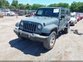2014 Jeep Wrangler Unlimited — photo 2 of 16 | VIN 1C4HJWEG4EL321361