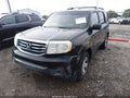 2012 Honda Pilot — photo 2 of 16 | VIN 5FNYF3H23CB033136