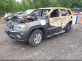2015 Jeep Grand Cherokee — photo 2 of 10 | VIN 1C4RJFAG3FC675030