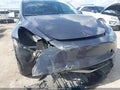 2022 Tesla Model Y — photo 6 of 14 | VIN 7SAYGDEF8NF494767