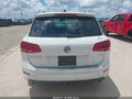 2014 Volkswagen Touareg — photo 16 of 17 | VIN WVGDP9BP2ED014134