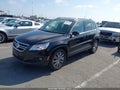 2011 Volkswagen Tiguan — photo 2 of 11 | VIN WVGAV7AX3BW521736