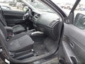 2013 Mitsubishi Outlander Sport — photo 5 of 11 | VIN 4A4AP4AU0DE021330