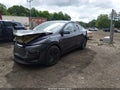 2026 Tesla Model Y — photo 2 of 15 | VIN 7SAYGDEE5TA476793