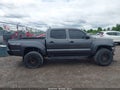 2015 Toyota Tacoma — photo 14 of 17 | VIN 3TMLU4EN2FM207198