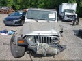 2004 Jeep Wrangler — photo 13 of 17 | VIN 1J4FA49SX4P759670