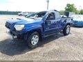 2014 Toyota Tacoma — photo 2 of 16 | VIN 5TFTU4GN8EX055269