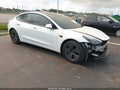 2023 Tesla Model 3 — photo 1 of 16 | VIN 5YJ3E1EA2PF697494