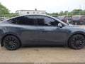 2022 Tesla Model Y — photo 13 of 18 | VIN 7SAYGDEF6NF372523