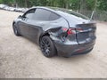 2022 Tesla Model Y — photo 3 of 18 | VIN 7SAYGDEF6NF372523