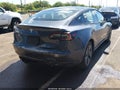 2022 Tesla Model 3 — photo 6 of 18 | VIN 5YJ3E1EA7NF122076