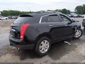 2013 Cadillac SRX — photo 4 of 16 | VIN 3GYFNCE37DS629599