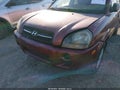 2006 Hyundai Tucson — photo 6 of 14 | VIN KM8JM12B26U353625