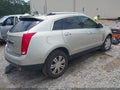 2013 Cadillac SRX — photo 4 of 17 | VIN 3GYFNCE38DS641972