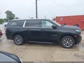 2023 Chevrolet Suburban — photo 13 of 19 | VIN 1GNSCCKD1PR541203