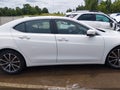 2016 Acura TLX — photo 13 of 16 | VIN 19UUB3F55GA000839