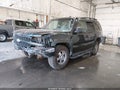 2002 Chevrolet Tahoe — photo 2 of 16 | VIN 1GNEK13ZX2R311621