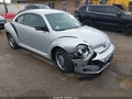 2012 Volkswagen Beetle — photo 1 of 17 | VIN 3VWJX7AT2CM608148