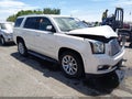 2015 GMC Yukon — photo 1 of 16 | VIN 1GKS2CKJ4FR586429