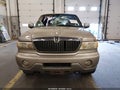 2001 Lincoln Navigator — photo 12 of 16 | VIN 5LMFU28R31LJ32062