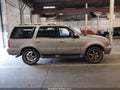 2001 Lincoln Navigator — photo 13 of 16 | VIN 5LMFU28R31LJ32062