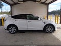 2023 Tesla Model Y — photo 15 of 18 | VIN 7SAYGAEE4PF827006