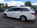 2015 Honda Odyssey — photo 14 of 16 | VIN 5FNRL5H61FB039324