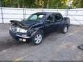 2012 Honda Ridgeline — photo 2 of 16 | VIN 5FPYK1F52CB458173