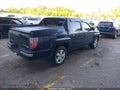 2012 Honda Ridgeline — photo 4 of 16 | VIN 5FPYK1F52CB458173