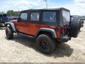 2014 Jeep Wrangler Unlimited — photo 3 of 19 | VIN 1C4BJWDG5EL238643