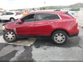 2014 Cadillac SRX — photo 13 of 16 | VIN 3GYFNBE37ES564121
