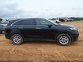 2019 Kia Sorento — photo 13 of 16 | VIN 5XYPG4A50KG558178