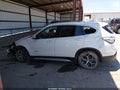 2018 BMW X1 — photo 14 of 16 | VIN WBXHT3Z38J4A66305
