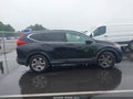 2017 Honda CR-V — photo 13 of 16 | VIN 7FARW1H80HE002659
