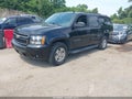 2011 Chevrolet Suburban 1500 — photo 2 of 16 | VIN 1GNSKJE32BR401809