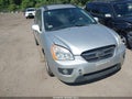 2008 Kia Rondo — photo 1 of 11 | VIN KNAFG526187194039