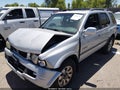 1999 Honda Passport — photo 2 of 12 | VIN 4S6CK58W8X4418194