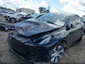 2022 Tesla Model Y — photo 10 of 10 | VIN 7SAYGDEE7NF435216