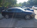 2014 Chevrolet Impala — photo 13 of 16 | VIN 1G1125S33EU112562