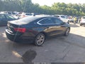 2014 Chevrolet Impala — photo 4 of 16 | VIN 1G1125S33EU112562